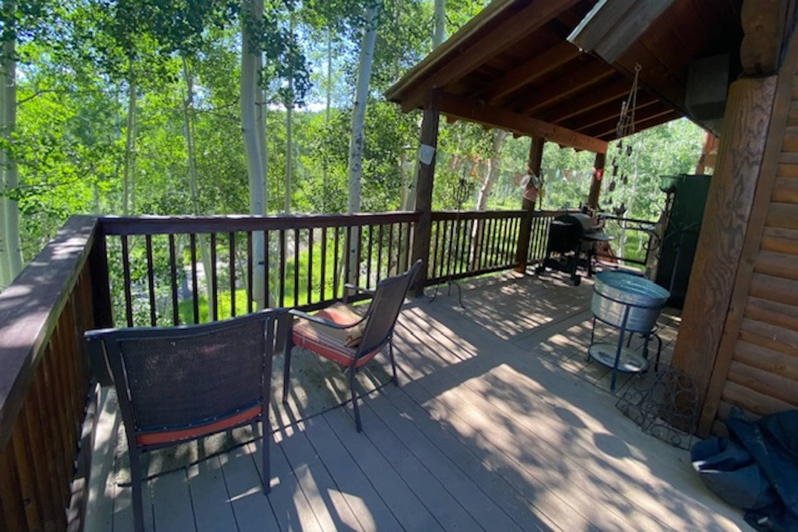 Wooden terrace with chairs